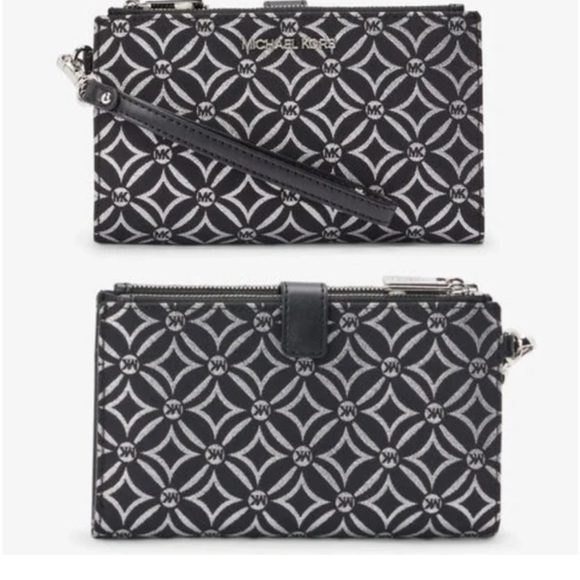 Michael Kors Handbags - NWT RETAILS $258 Michael Kors jet set travel wallet
